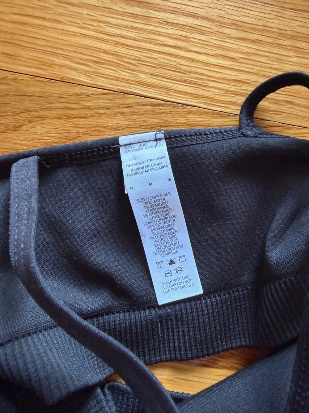 Nike Black High-Neck Ribbed Sports Bralette with White Swoosh